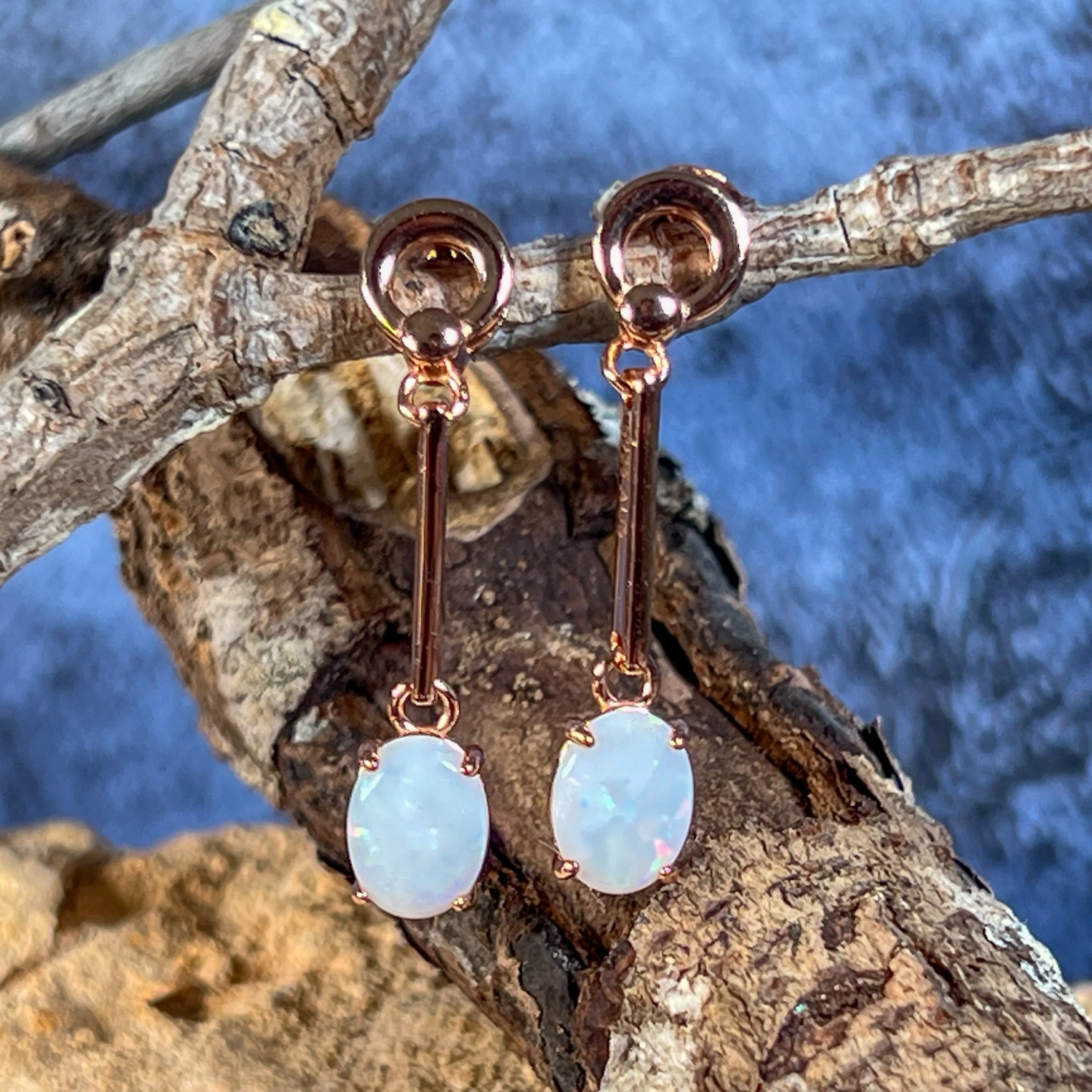 Rose Gold plated Silver dangling claw set White Opal earrings