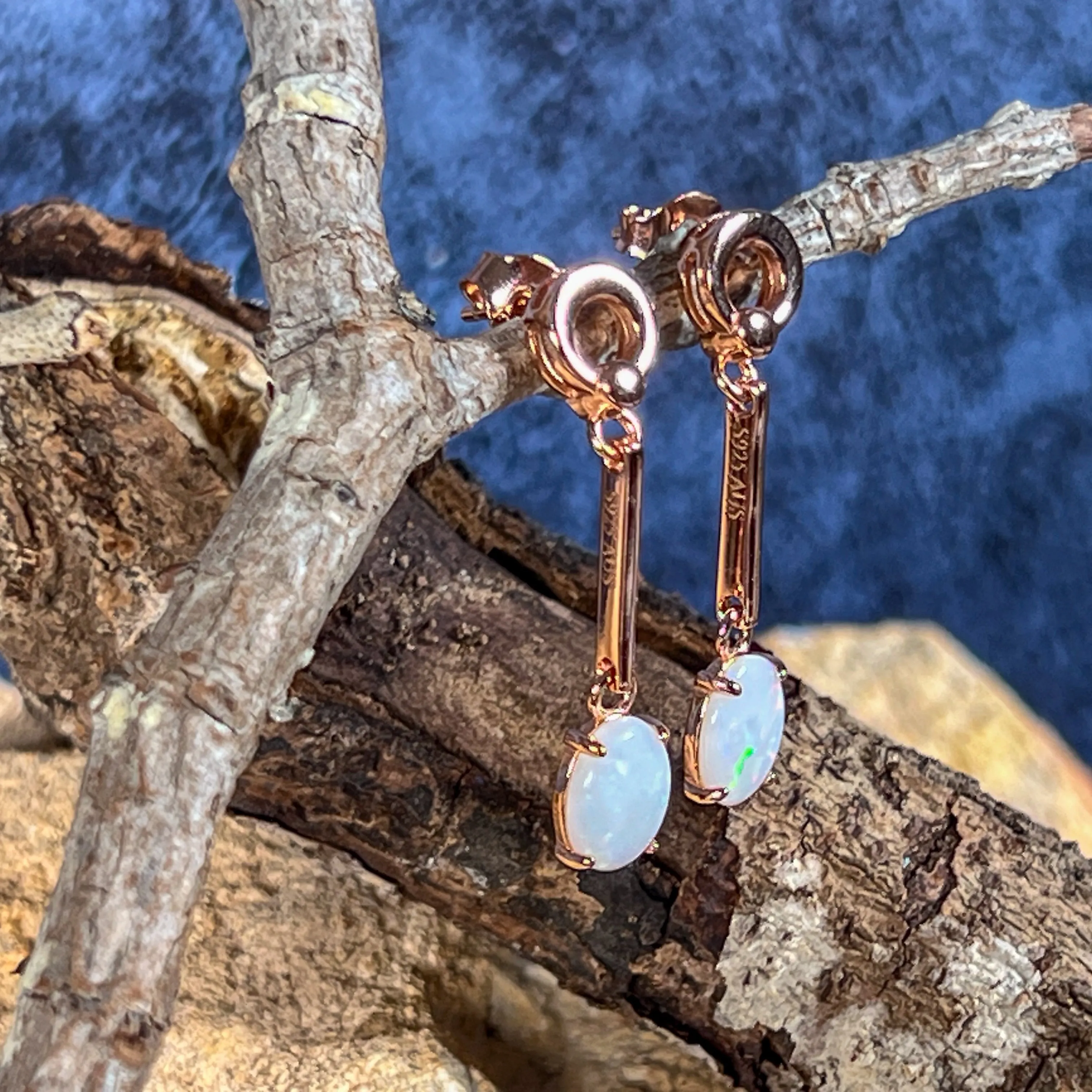 Rose Gold plated Silver dangling claw set White Opal earrings