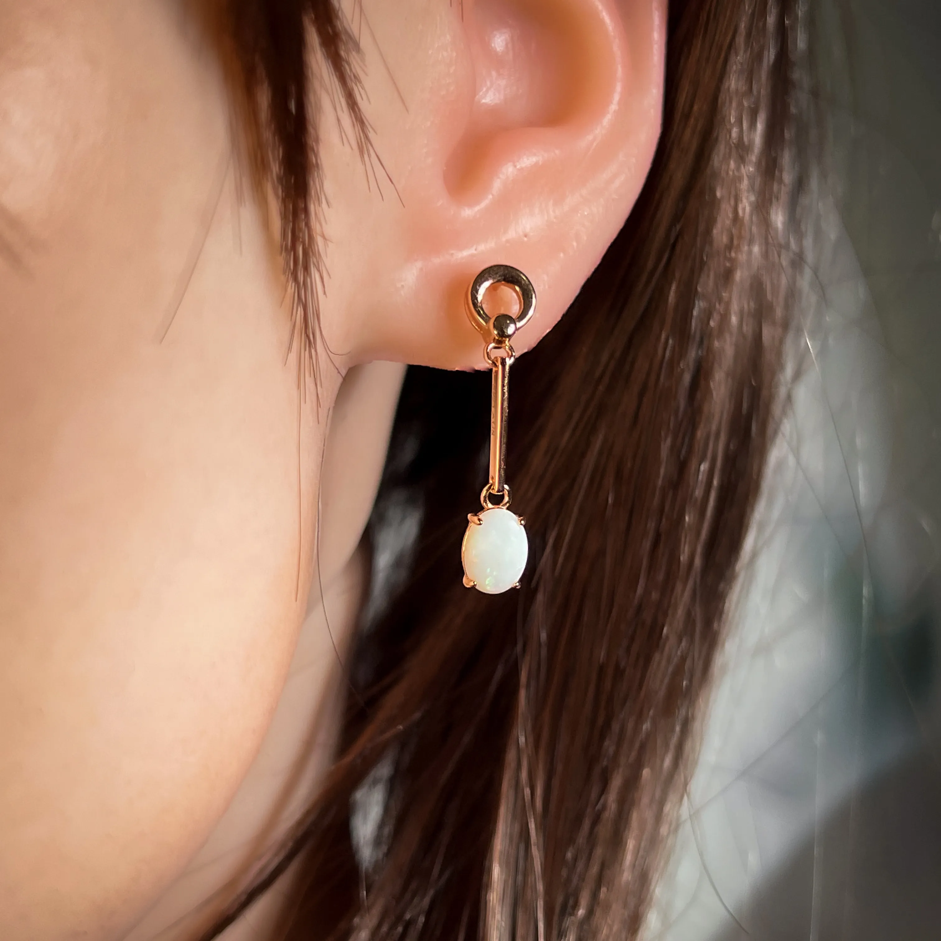 Rose Gold plated Silver dangling claw set White Opal earrings